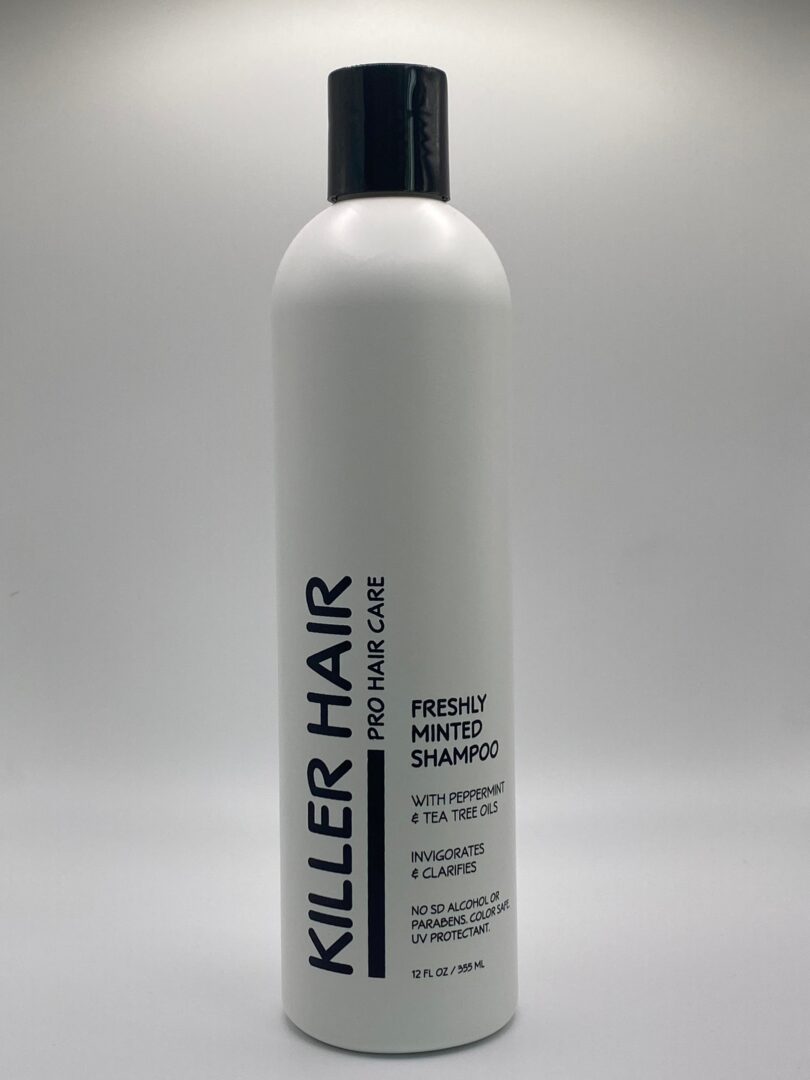 A bottle of shampoo for hair is shown.